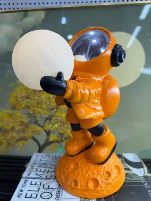 astronaut with moon light figurine 2