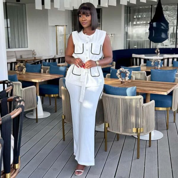 women's white sleeveless shirt and pant suit
