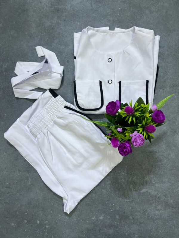 women's white sleeveless shirt and pant suit