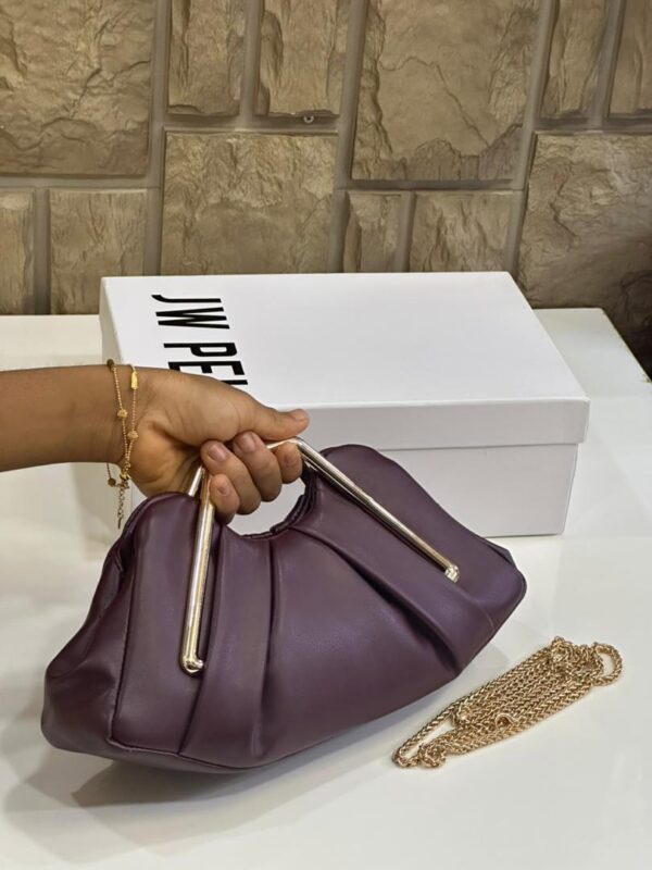 women metal frame clutch bags