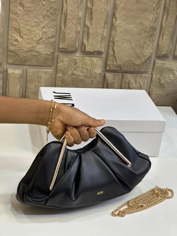 women metal frame clutch bags