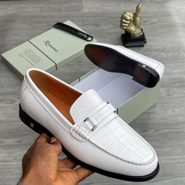 large scale croc-embossed leather loafers