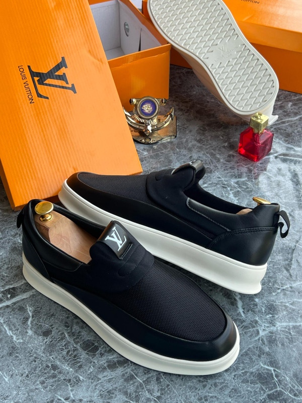 men's black slip on sneakers. 2 men's black slip on sneakers. 2