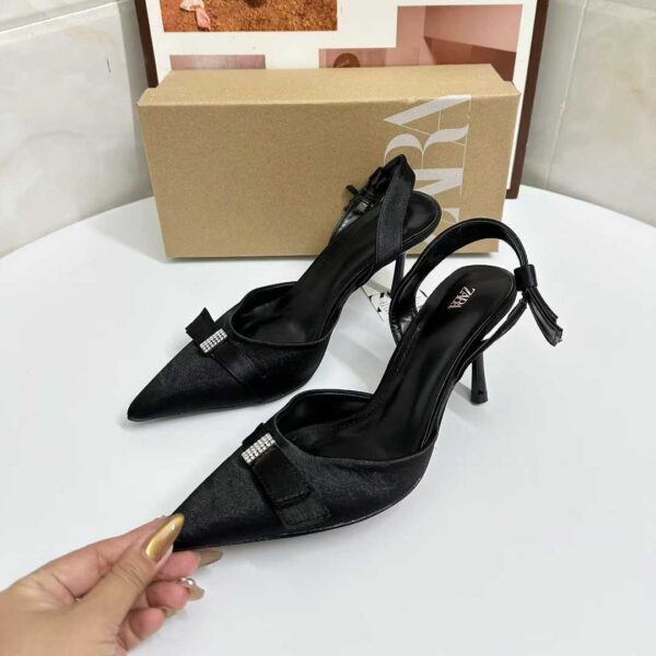 ladies black slingback kitten pumps