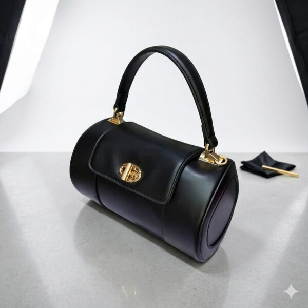 black leather cylinder bag