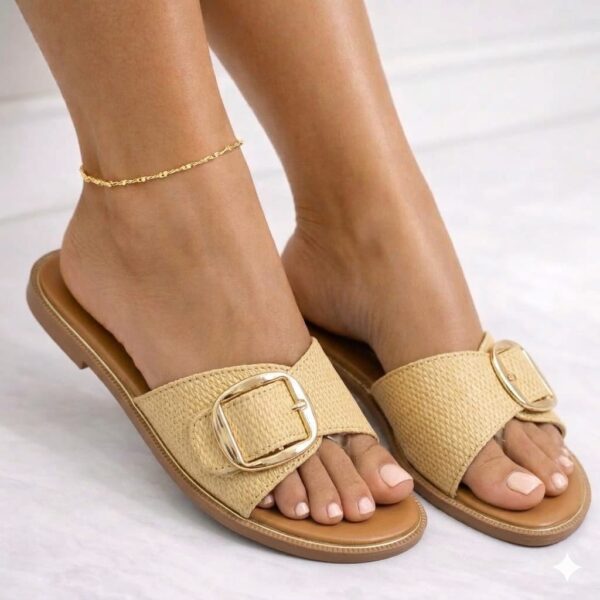 women buckled open-toe slippers