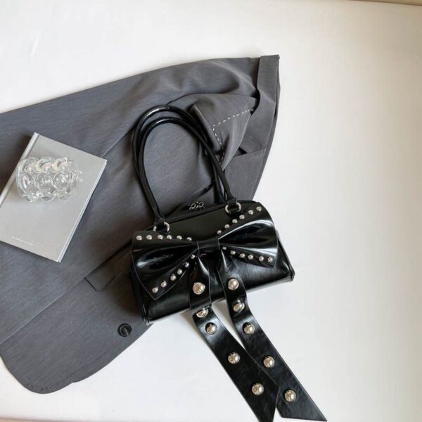 studded bow accent luxe bag