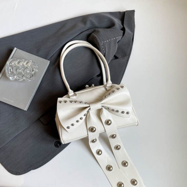 studded bow accent luxe bag